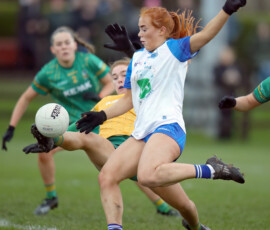Meath keeper Robyn Murray manages to get a toe to the ball to take it off the boot of Waterfords Maeve Daly who was ready to fire into the back of the net