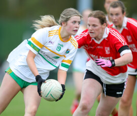 Na Deises Holly Lonergan looks to get a pass away before Stradballys Tracey Fennell can put a challenge in during the Waterford LGFA Junior C County Final between Na Deise & Stradbally which was played in the Dungarvan GAA grounds