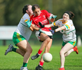 Stradballys Emma Keating is fouled by the Na Deise defence as she attempts a shot on goal during the Waterford LGFA Junior C County Final between Na Deise & Stradbally which was played in the Dungarvan GAA grounds